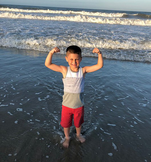 muscle boy beach