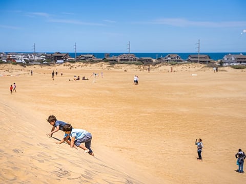 Climb Jockey's Ridge